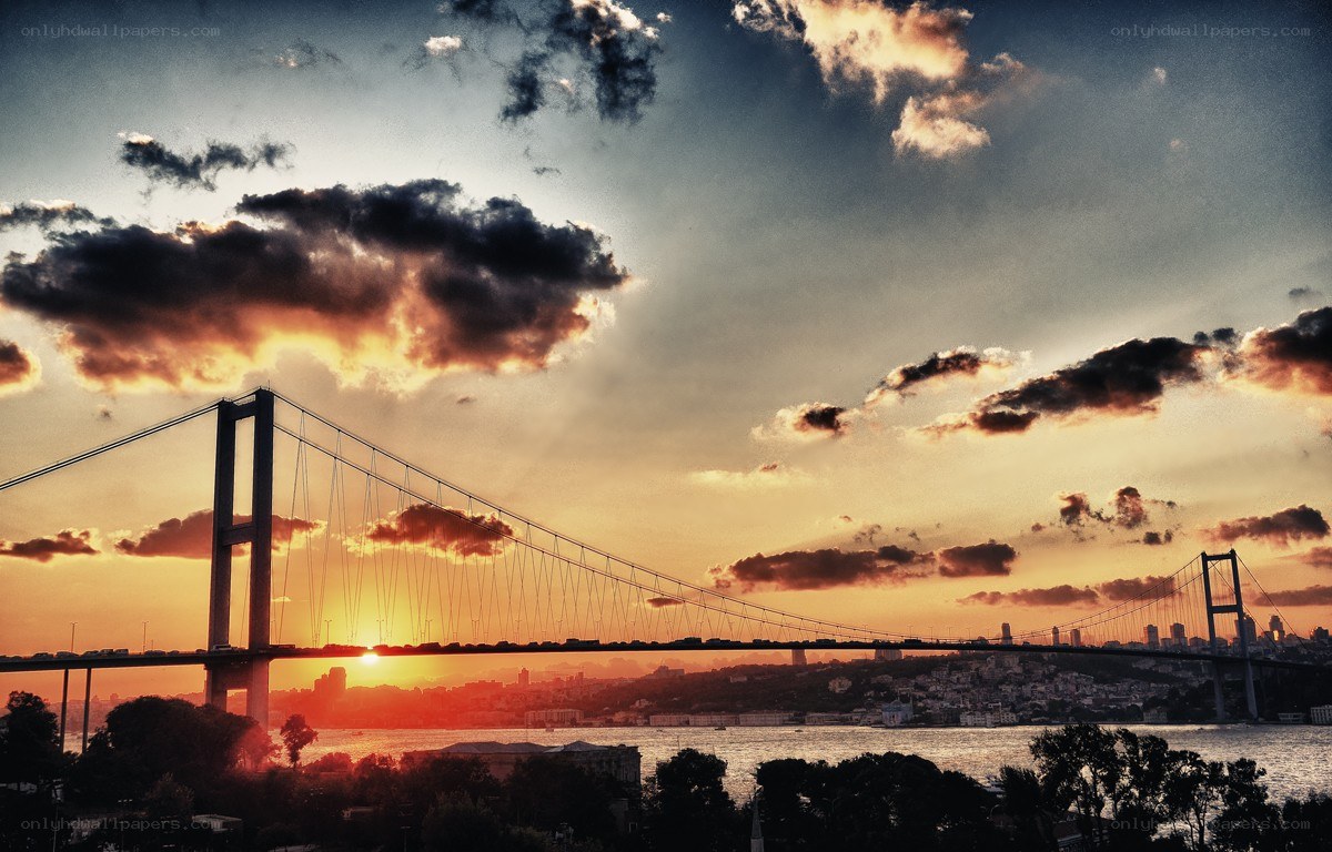 Sunset over a suspension bridge