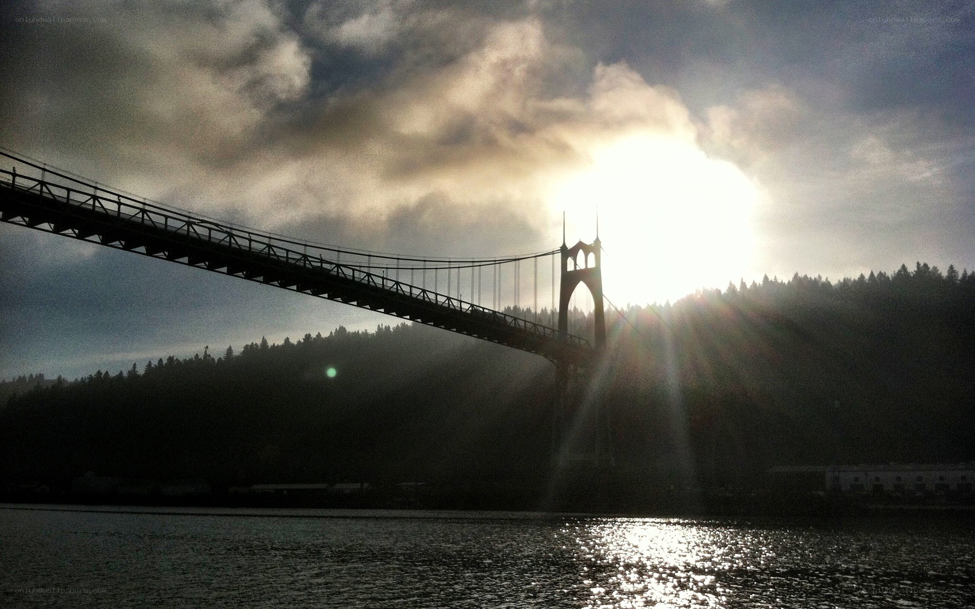 Sunset over a suspension bridge