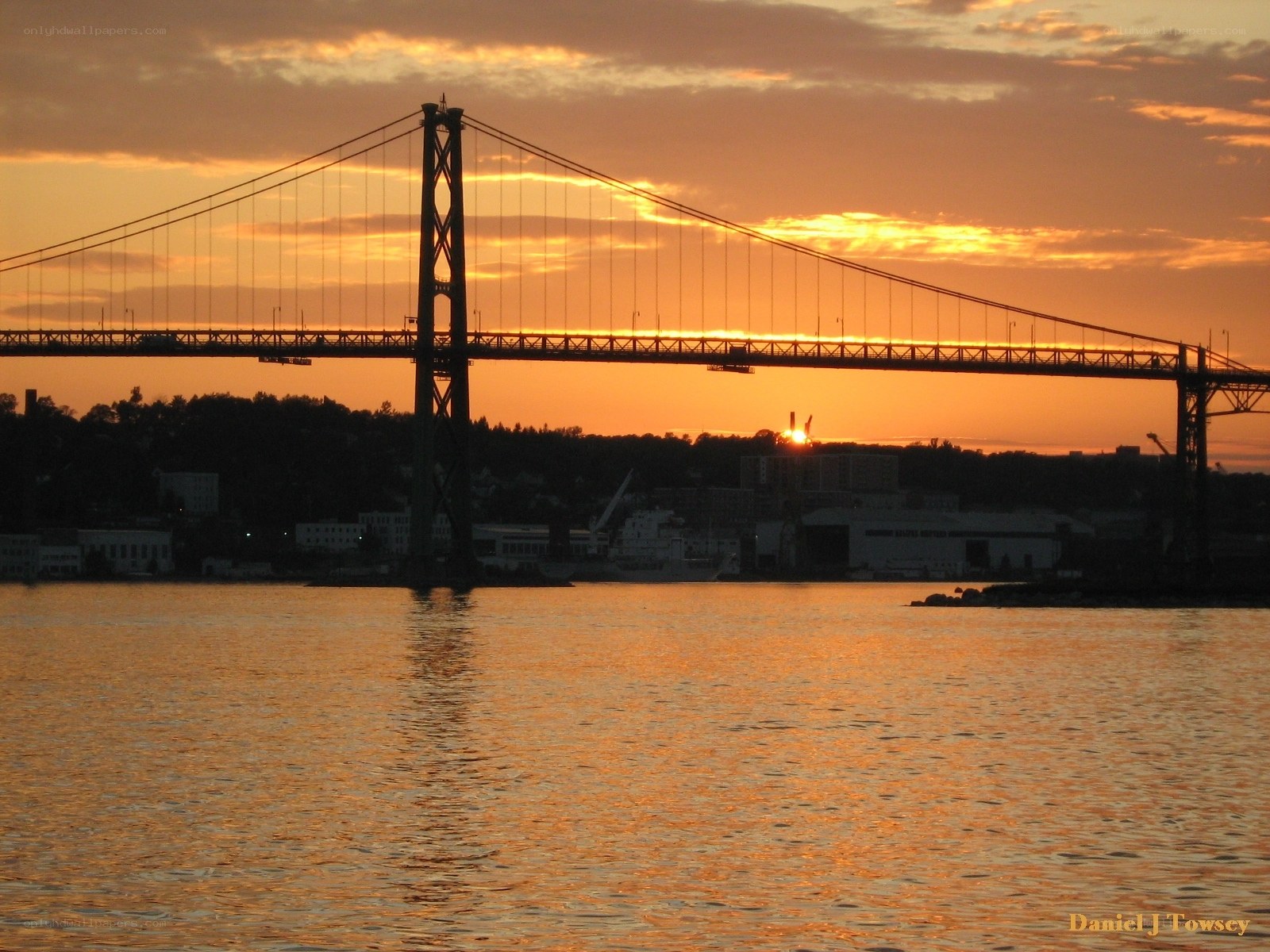 Sunset over a suspension bridge