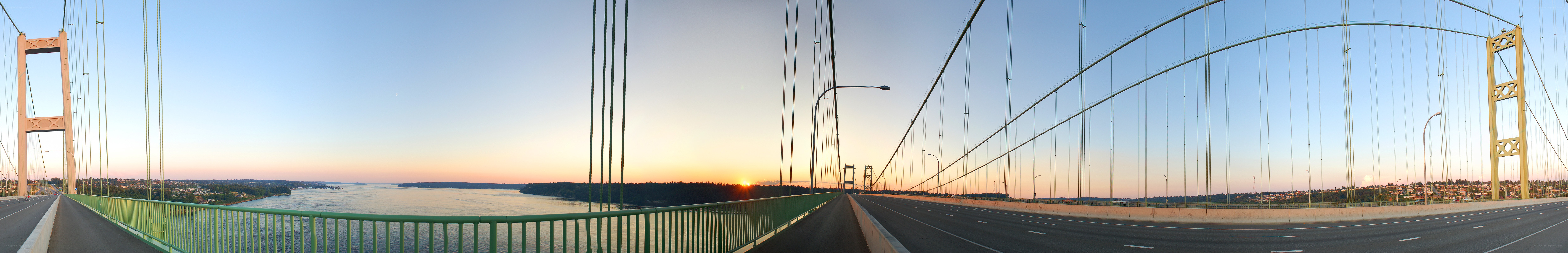 Sunset over a suspension bridge