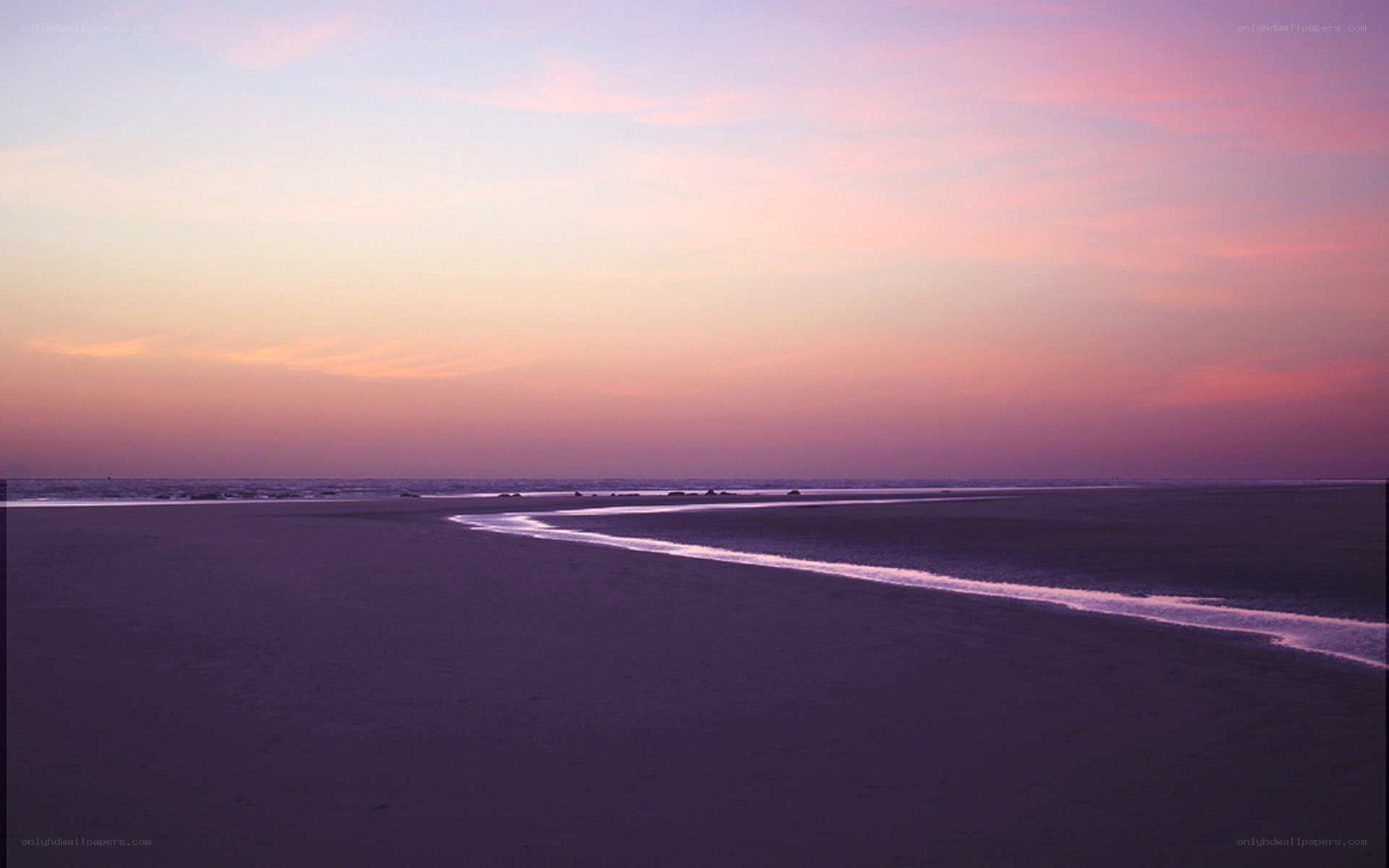 sunset over a tranquil beach