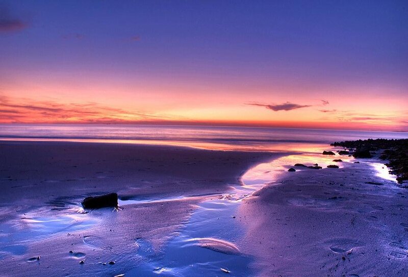 sunset over a tranquil beach