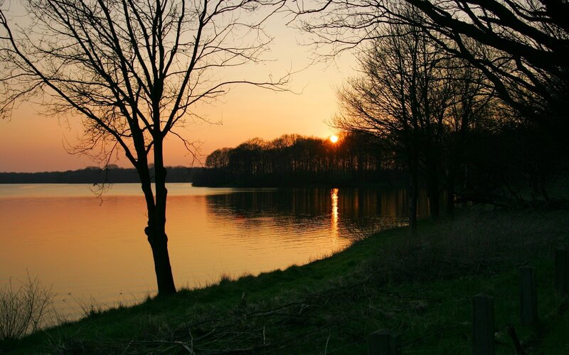 Sunset over a tranquil lake