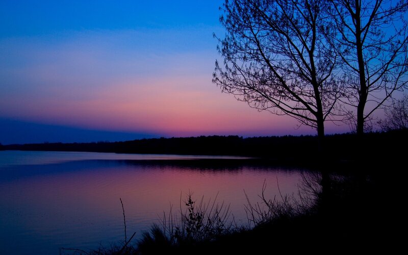 Sunset over a tranquil lake