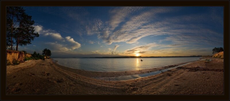 Sunset over a tranquil lake