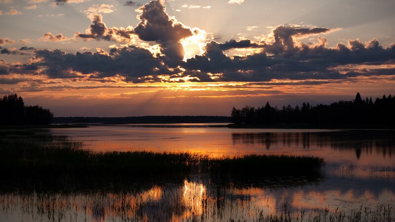 Sunset over a tranquil lake