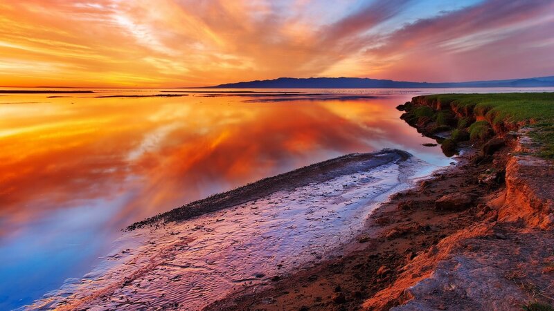 Sunset over a tranquil lake