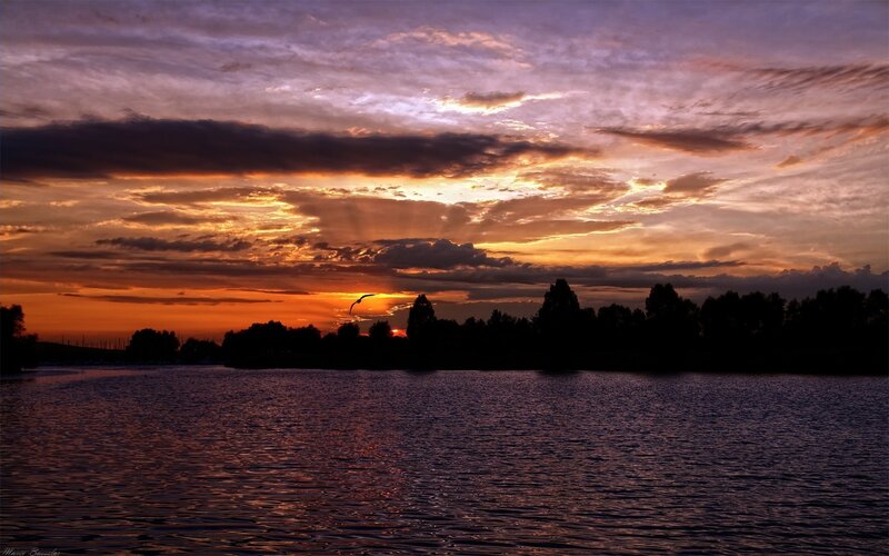 Sunset over a tranquil lake