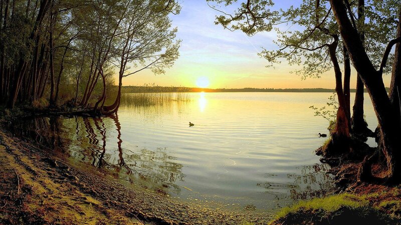 Sunset over a tranquil lake