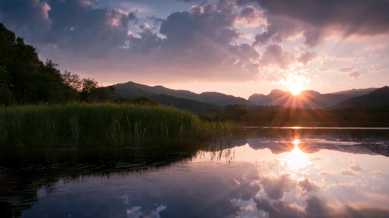 Sunset over a tranquil lake