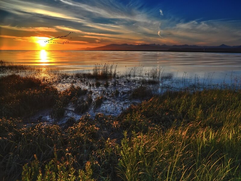 Sunset over a tranquil lake
