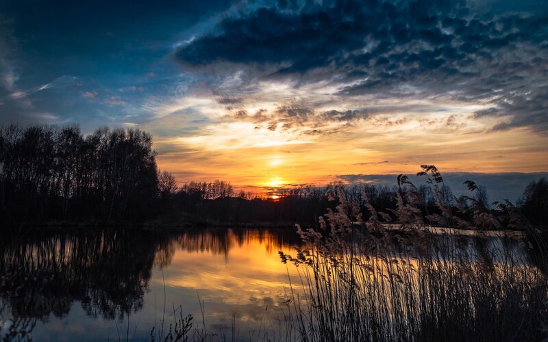 Sunset over a tranquil lake