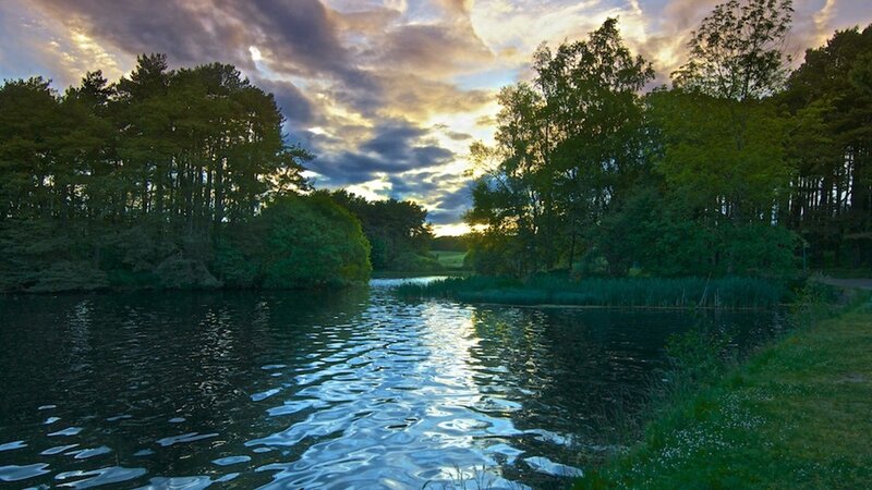 Sunset over a tranquil lake