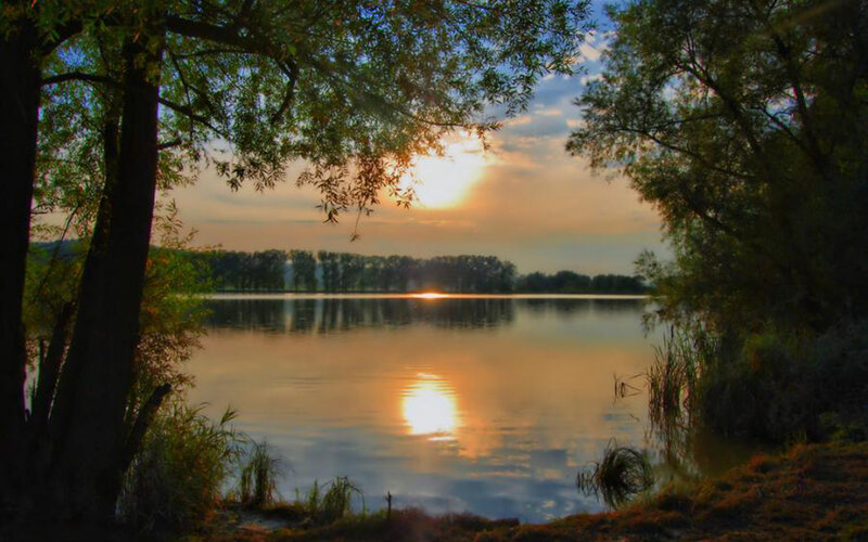 Sunset over a tranquil lake