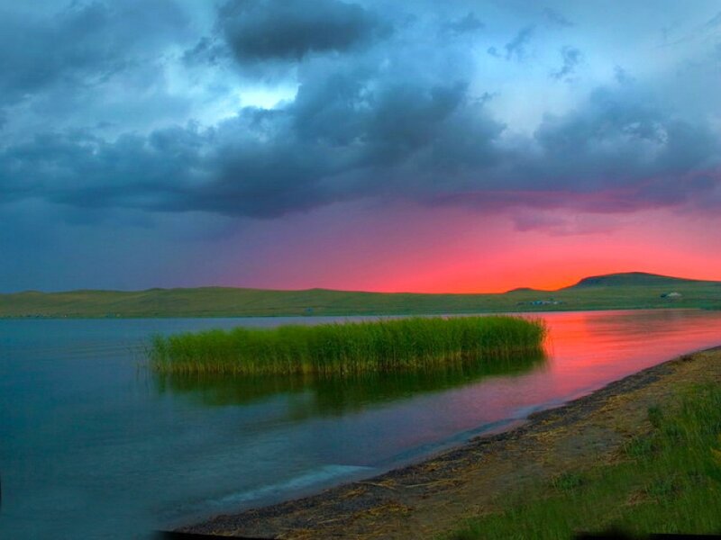 Sunset over a tranquil lake