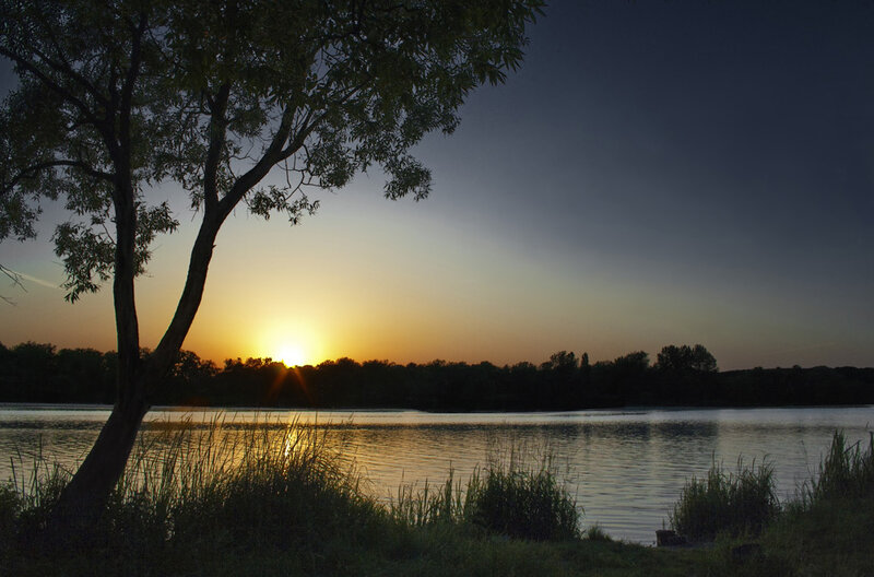 Sunset over a tranquil lake