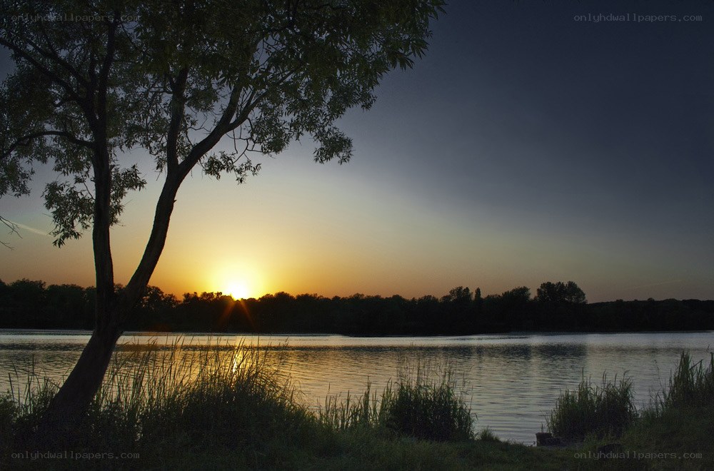Sunset over a tranquil lake