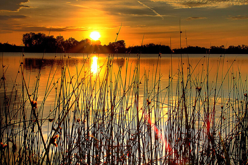 Sunset over a tranquil lake