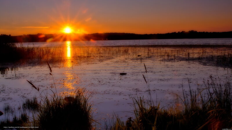 Sunset over a tranquil lake