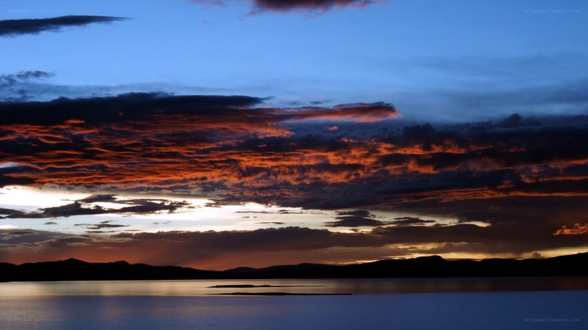 Sunset over a tranquil lake
