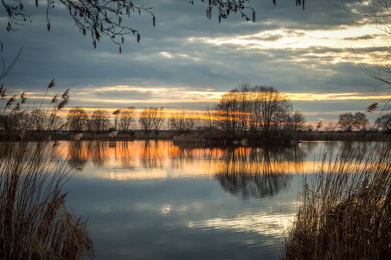 Sunset over a tranquil lake