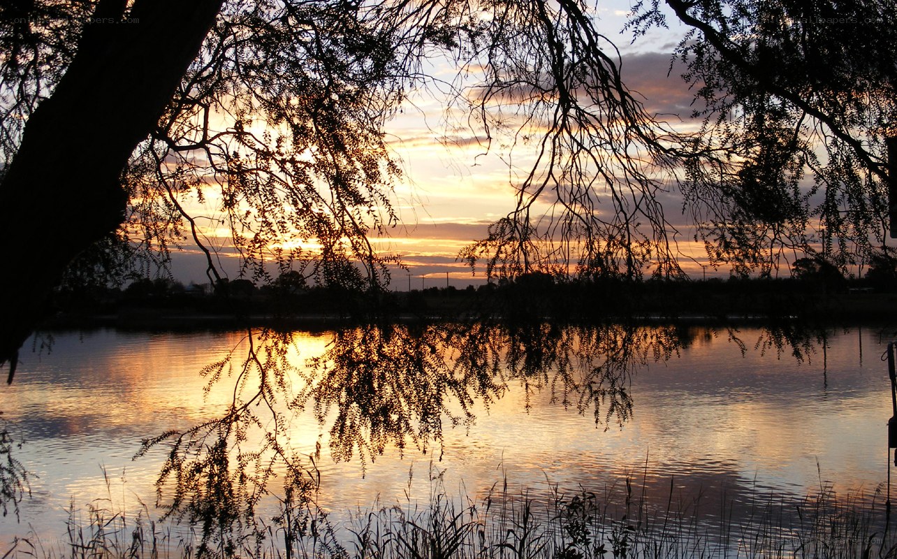 Sunset over a tranquil lake
