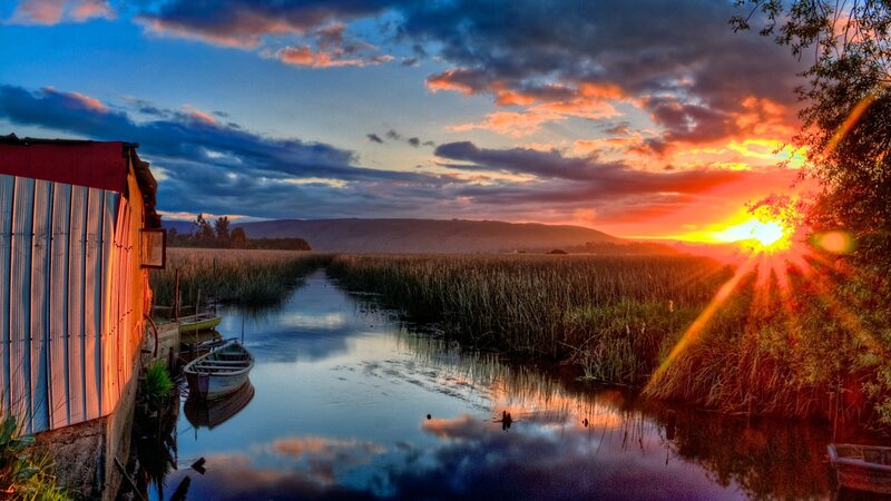 Sunset over a tranquil marsh