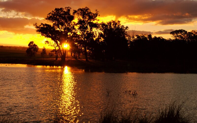 Sunset over a tranquil pond