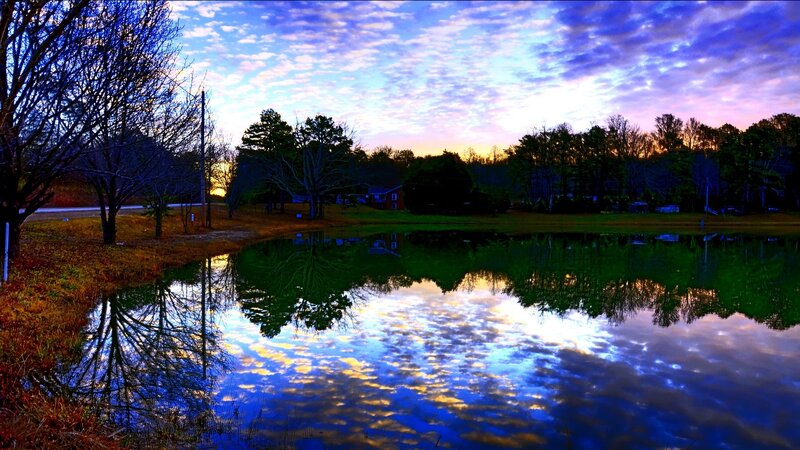 Sunset over a tranquil pond