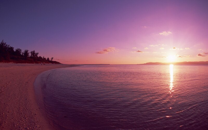 sunset over a tropical beach