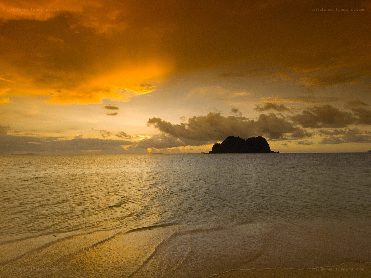 Sunset over a tropical island