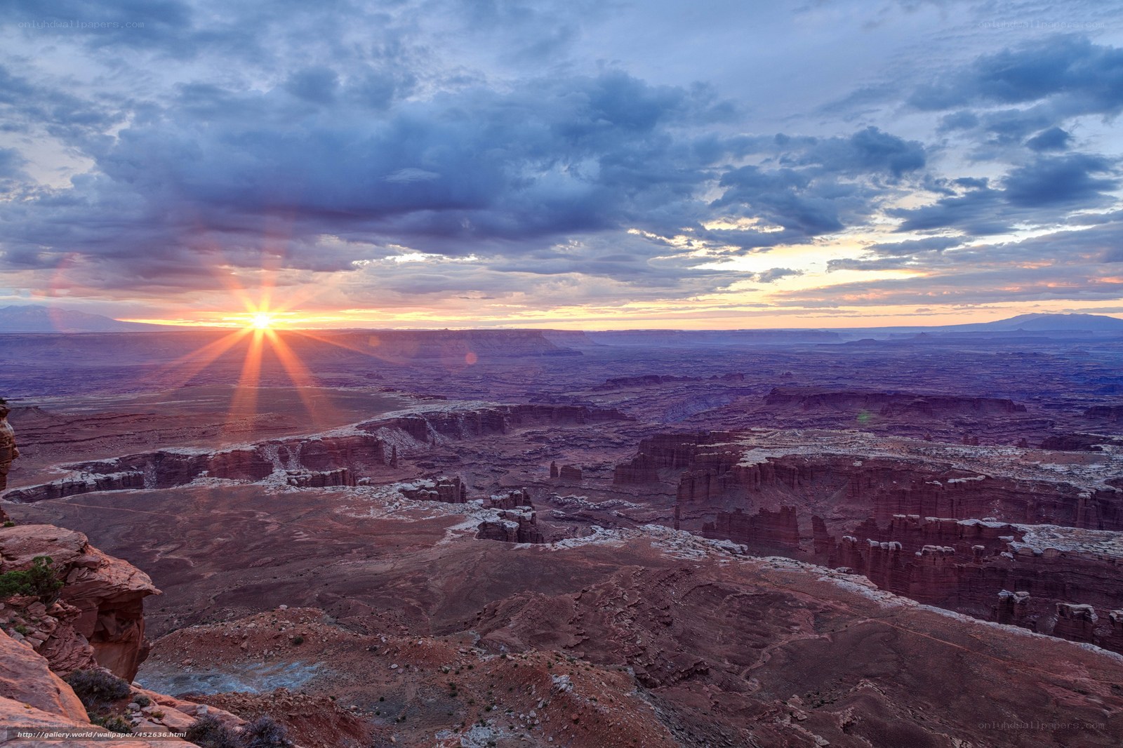 Sunset over a vast canyon