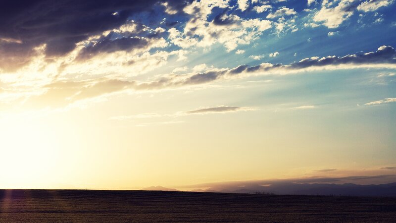 Sunset over a vast field