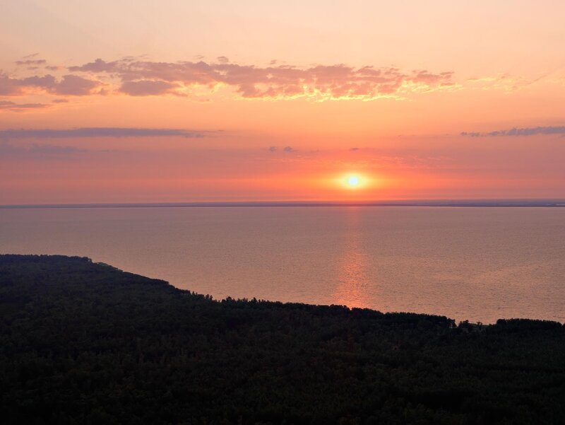 sunset over a vast lake