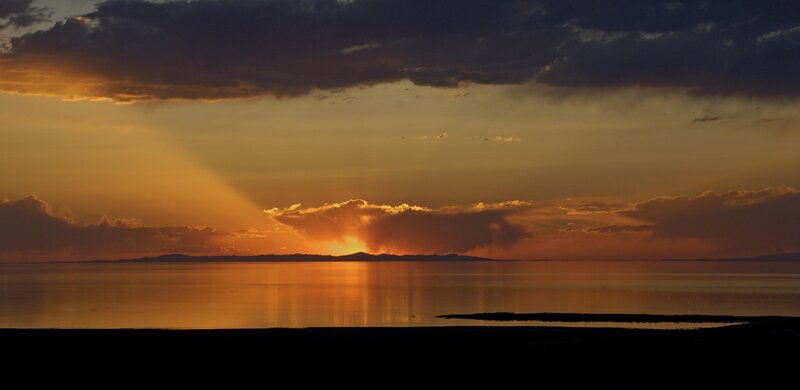 Sunset over a vast lake