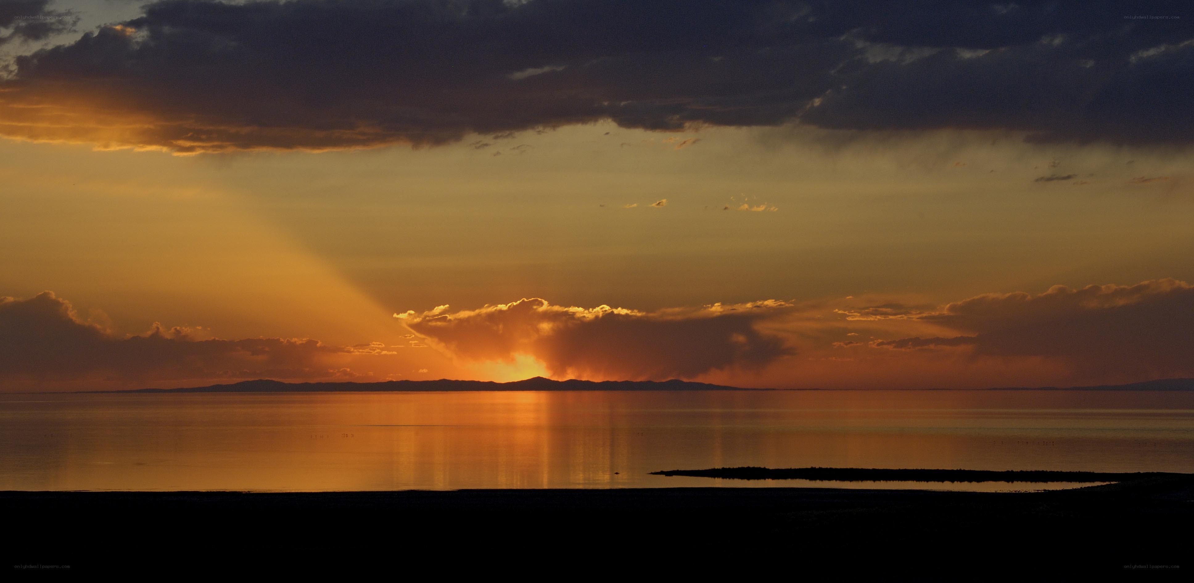 Sunset over a vast lake