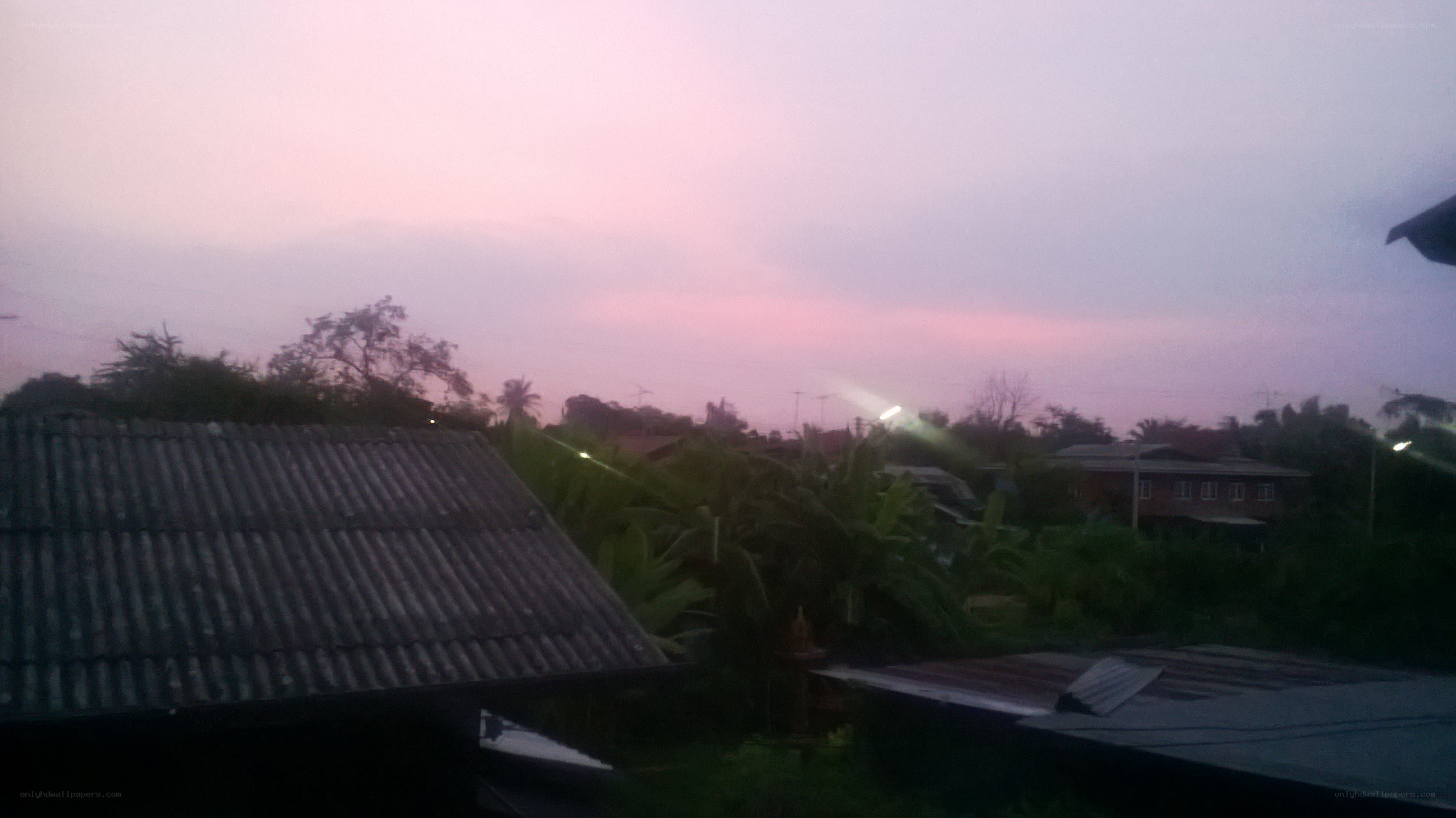 sunset over a village
