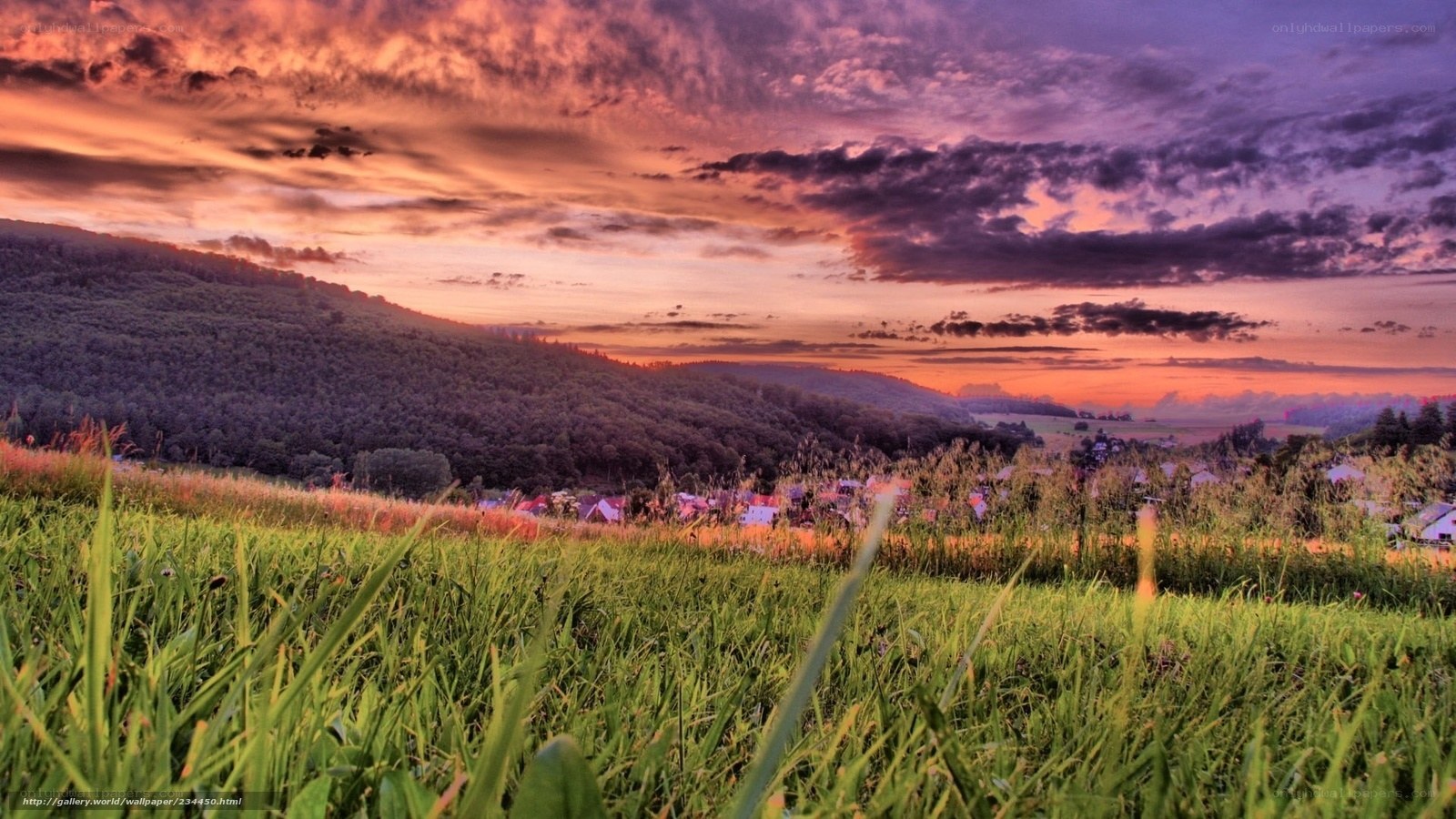 Sunset over a village valley
