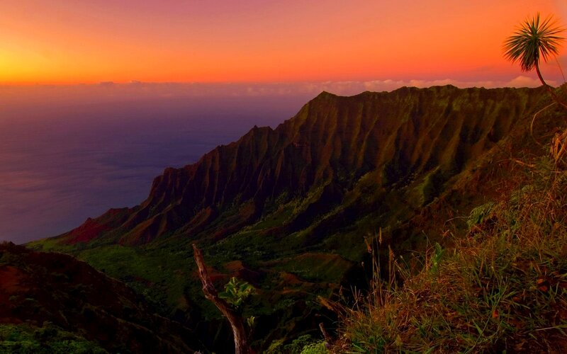 Sunset over a volcanic cliff