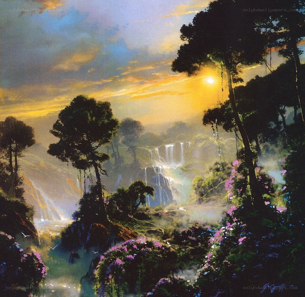 Sunset over a waterfall valley