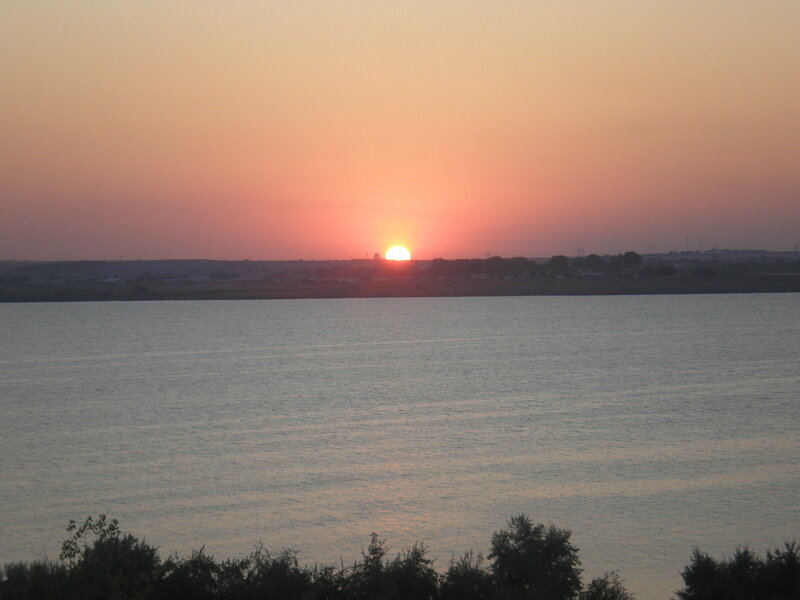 Sunset over a wide river
