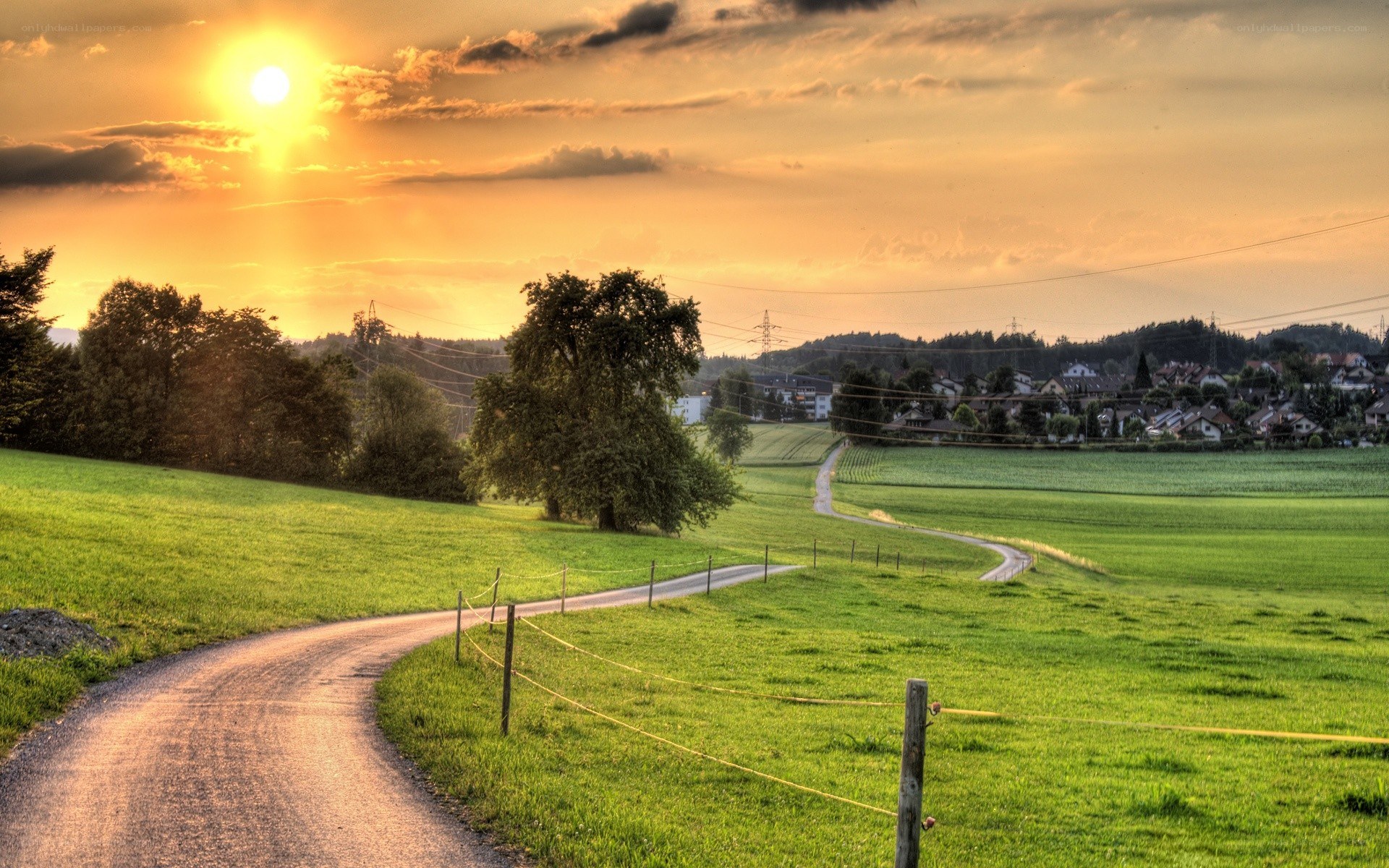 Sunset over a winding country road