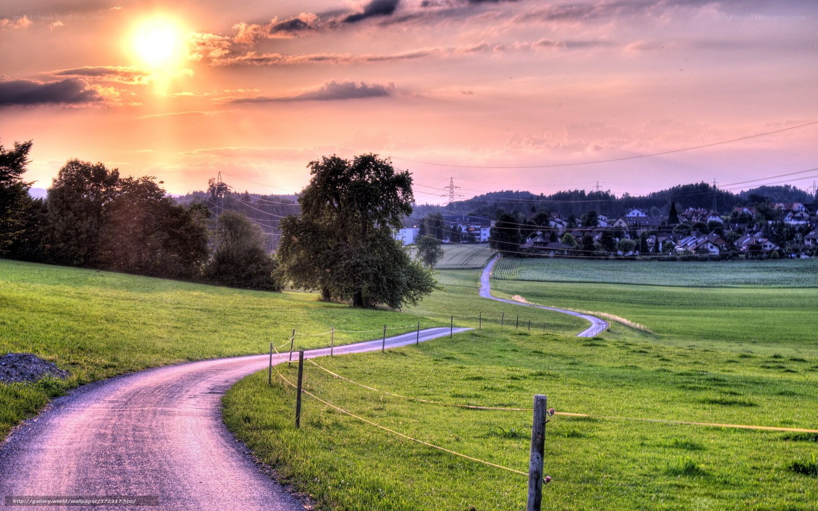 Sunset over a winding country road