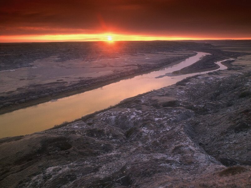 Sunset over a winding river