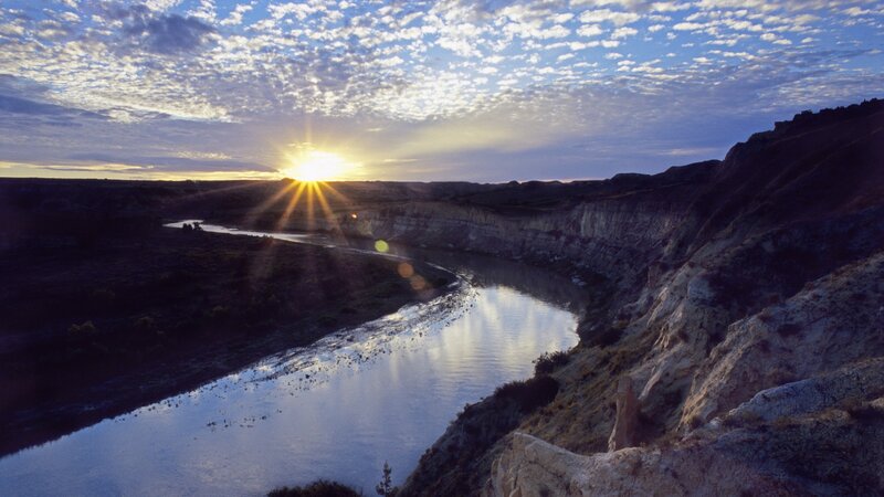 Sunset over a winding river