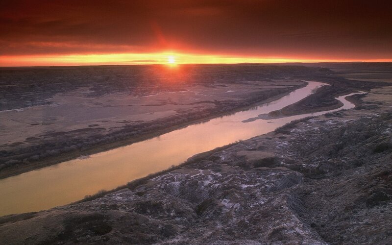 Sunset over a winding river
