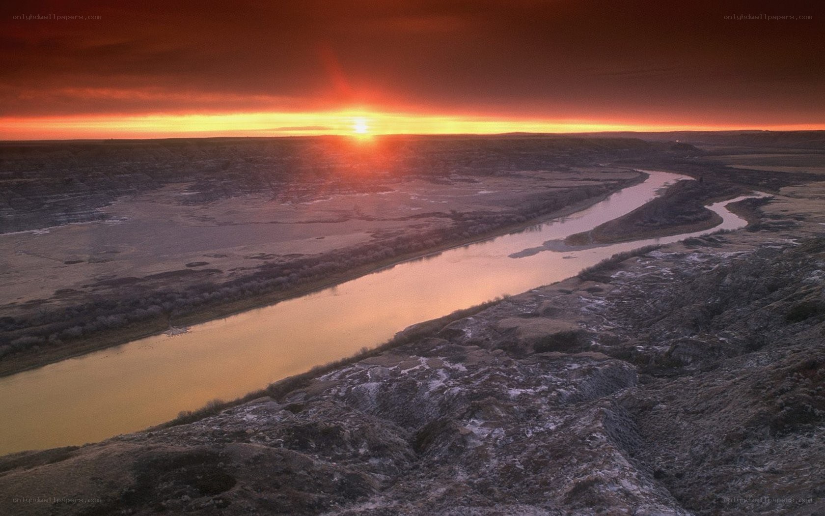 Sunset over a winding river