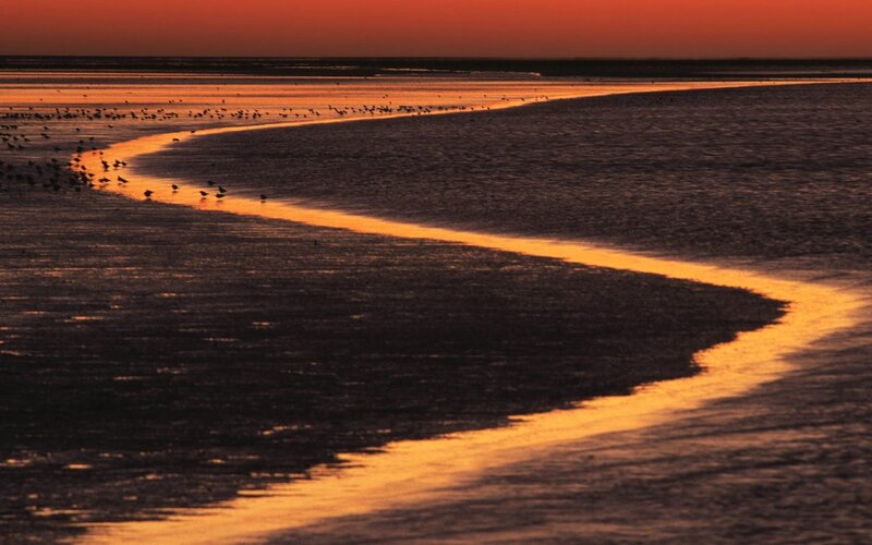 Sunset over a winding river
