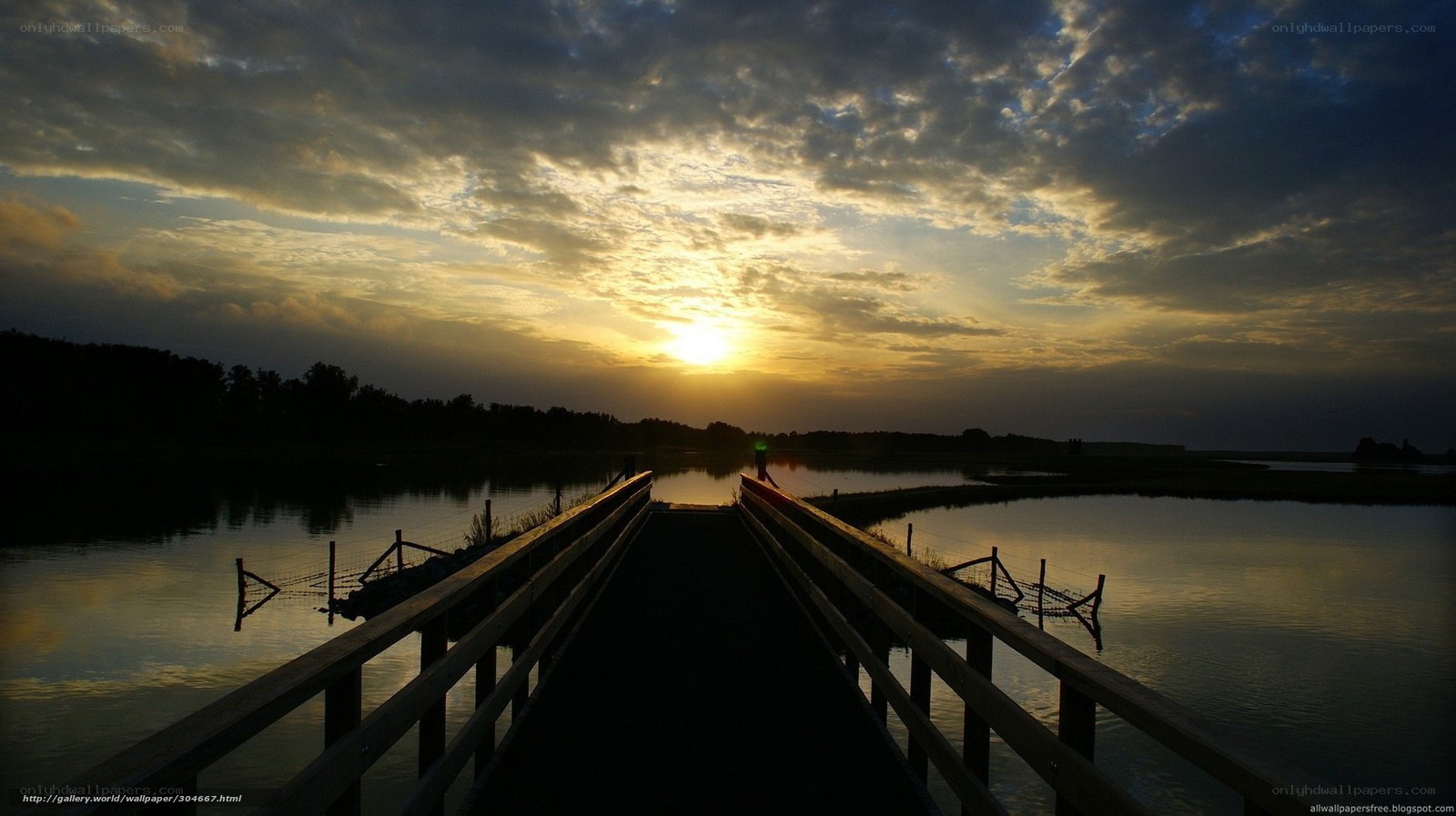 Sunset over a wooden bridge