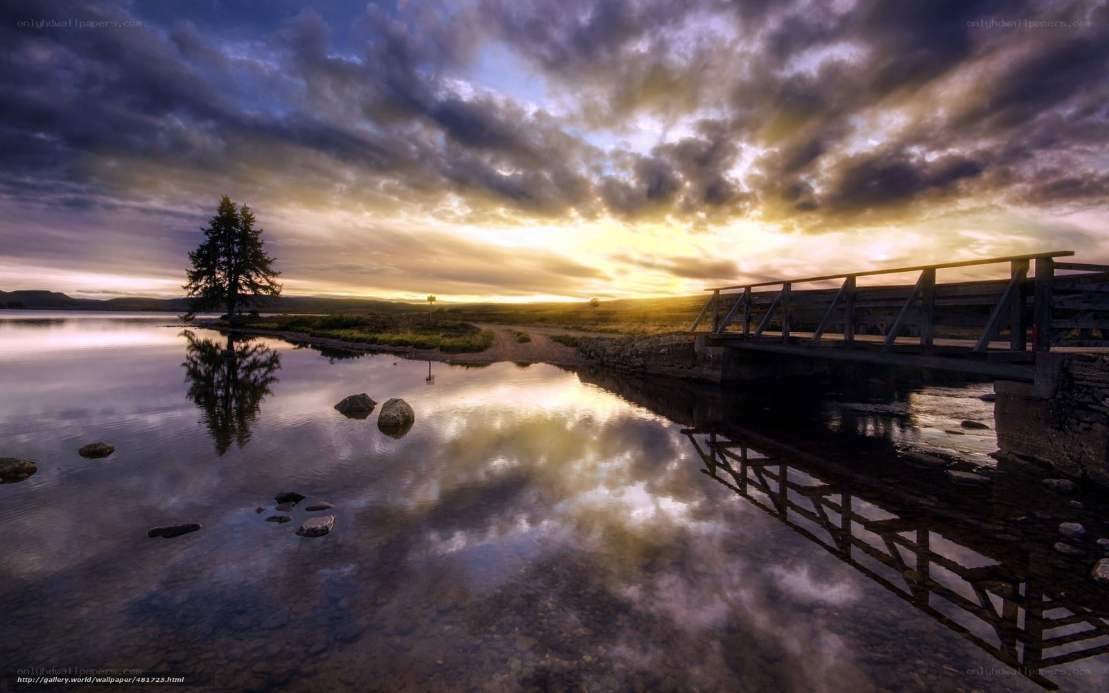 Sunset over a wooden bridge